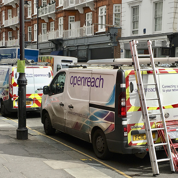 BT Openreach vans in a street